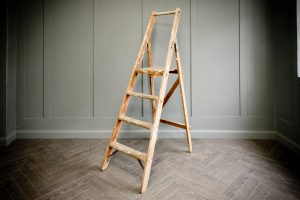 Medium sized original Slingsby stepladder with three steps complete with the slatted resting step at the top. Metal hinge detailing either side of the frame for folding. Ladder has authentic paint marks and is wonderfully worn from previous works and weathering.