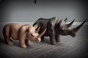 African Hand Carved Pair of Black and White Rhinos